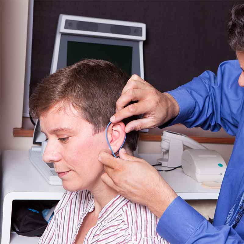 A Real Ear measurement test being performed by a hearing instrument specialist.
